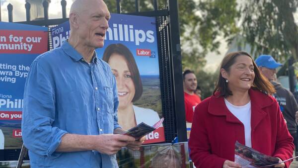 'Most important day': Midnight Oil's Peter Garrett greets voters at Bomaderry