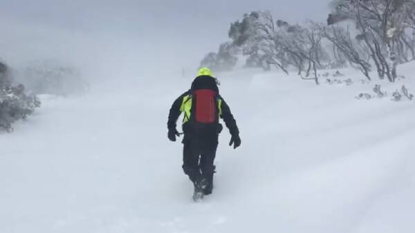 Emergency crews rescue eight people from mountain in 'extreme conditions'